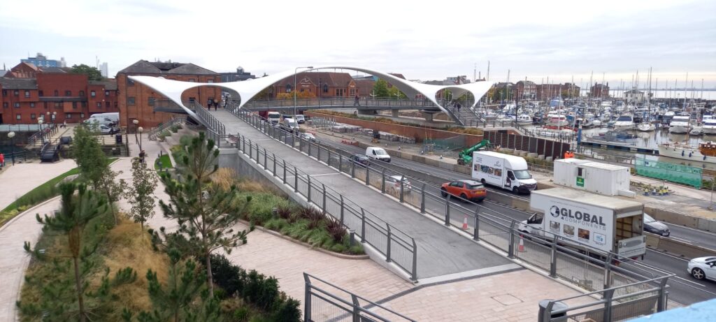 The pedestrian bridge across Castle Street in Hull links the town with its Marina. It is a modern bridge, white and looks, according to my stepson, like a brooding sloth.