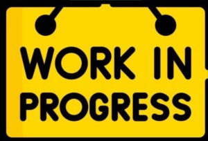 this is a yellow sign like a roadworks one, with black prints reading WORK IN PROGRESS.

It is a pictorial representation of an unseen process when writing, 
the almost never-ending, diligence required.